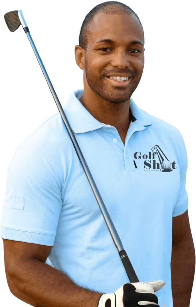 A man wearing a light blue polo shirt with a "Golf Shot" logo holds a golf club and smiles at the camera.
